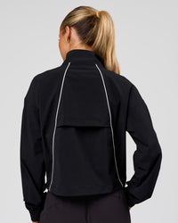 Woman wearing Pop Over Jacket - Black | Model:Issy | Size:XS | Thumbnail Index: 4