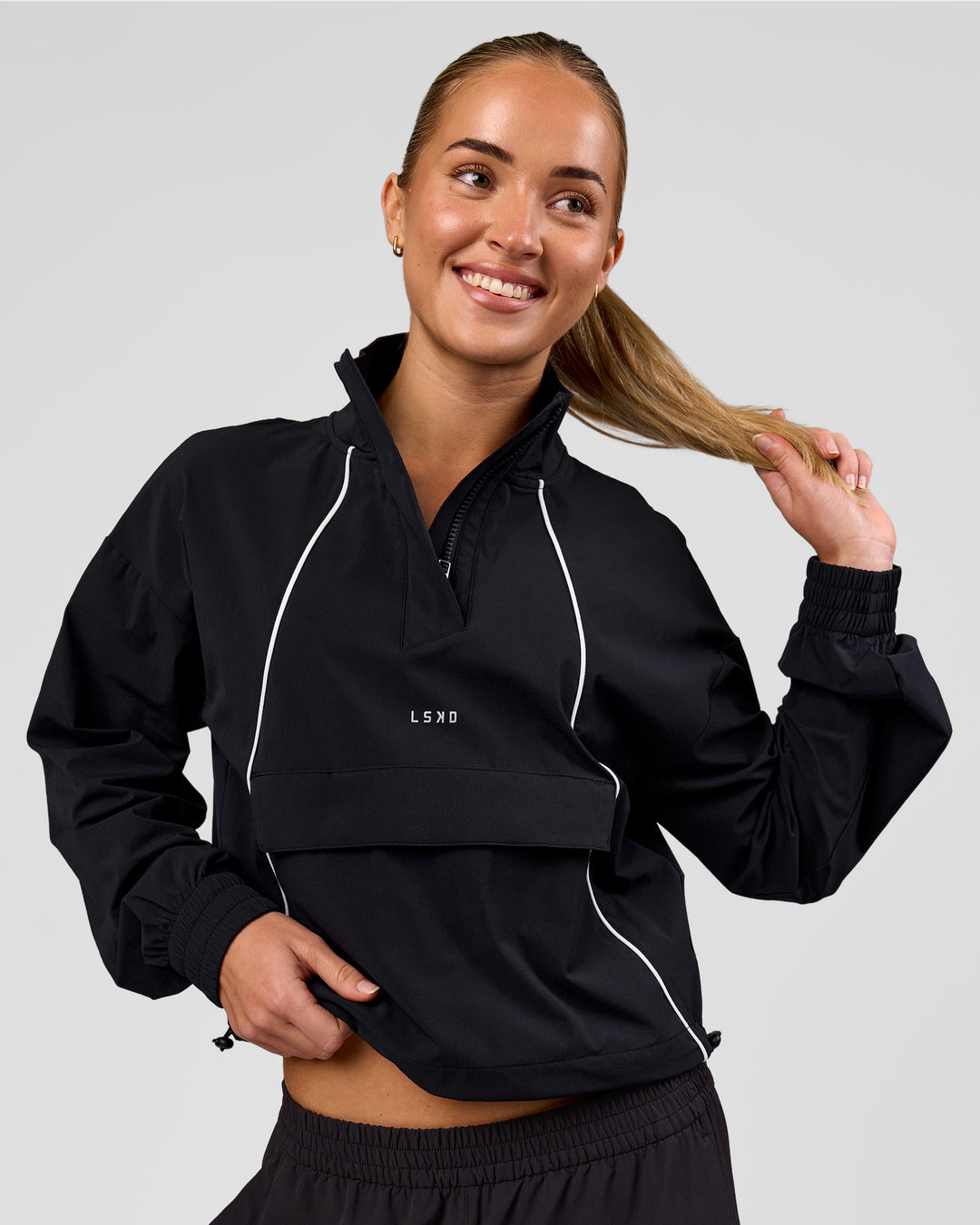 Woman wearing Pop Over Jacket - Black | Model:Issy | Size:XS - view 6