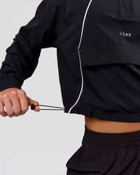 Woman wearing Pop Over Jacket - Black | Model:Issy | Size:XS | Thumbnail Index: 6