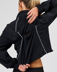 Woman wearing Pop Over Jacket - Black | Model:Issy | Size:XS | Thumbnail Index: 8