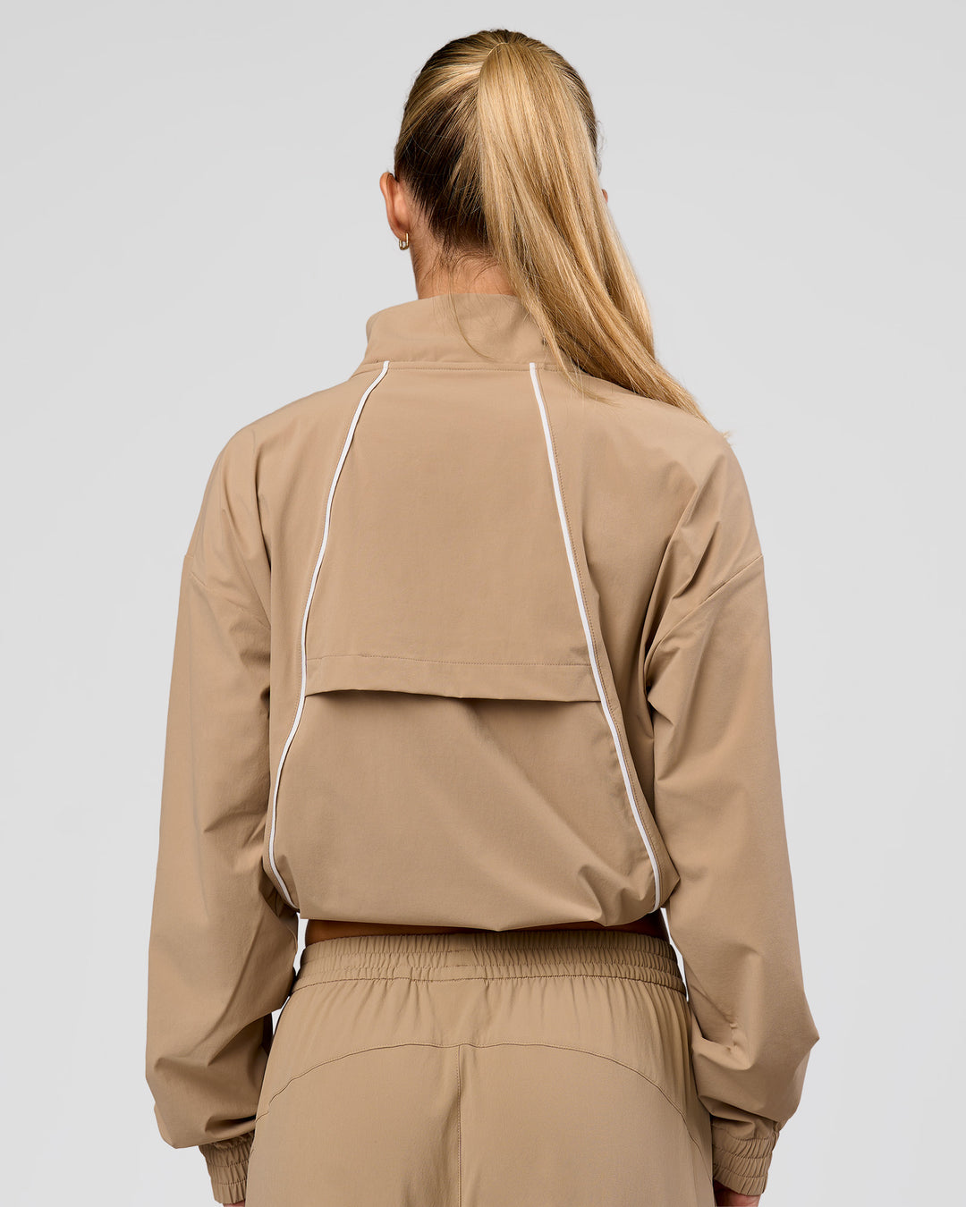 Woman wearing Pop Over Jacket - Warm Smoke | Model:Issy | Size:XS - view 5
