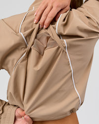 Woman wearing Pop Over Jacket - Warm Smoke | Model:Issy | Size:XS | Thumbnail Index: 9