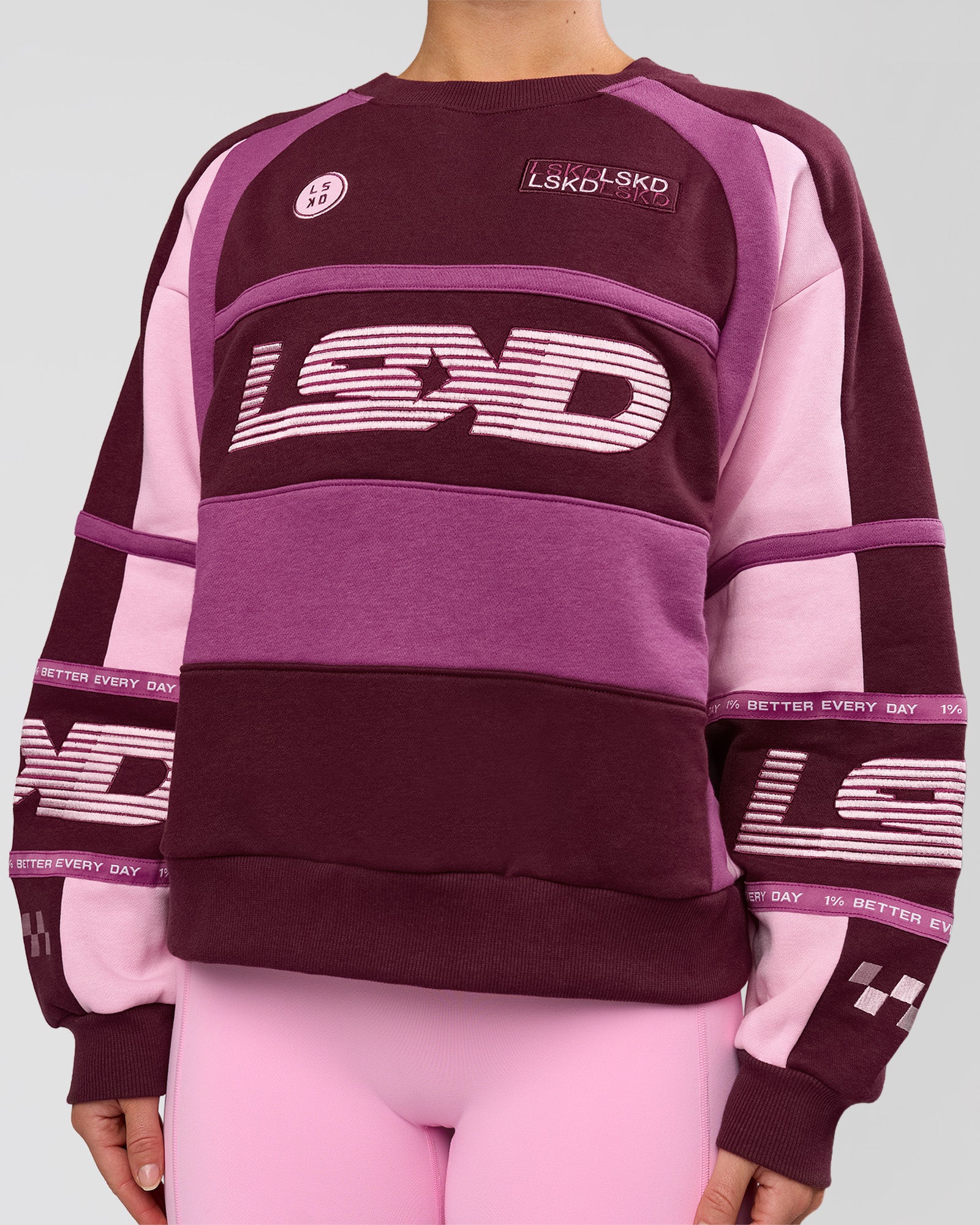 Woman wearing Power Sweater - Cherry Lacquer-Boysenberry | Model:Issy | Size:XS