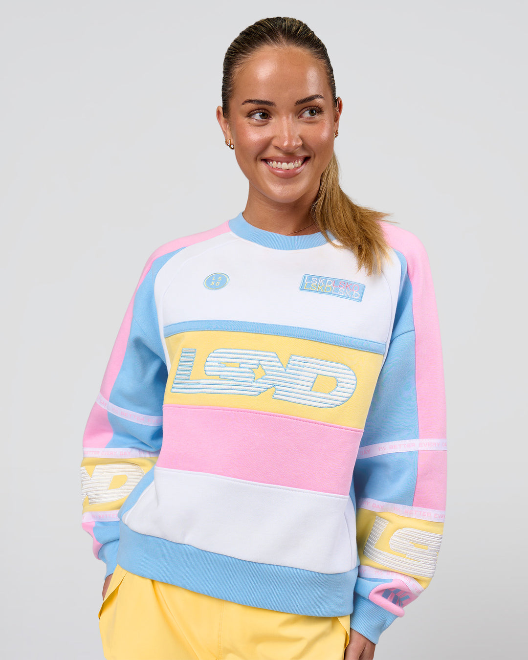 Woman wearing Power Sweater - Pink Rose-Lemon | Model:Issy | Size:XS - view 1