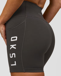 Woman wearing Rep Ultra High-Rise 4" Short Pockets - Onyx-White | Model:Issy | Size:XS | Thumbnail Index: 7
