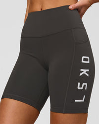 Woman wearing Rep Ultra High-Rise 6" Short Pockets - Onyx-white | Model:Issy | Size:XS | Thumbnail Index: 2