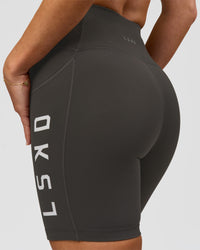 Woman wearing Rep Ultra High-Rise 6" Short Pockets - Onyx-white | Model:Issy | Size:XS | Thumbnail Index: 8