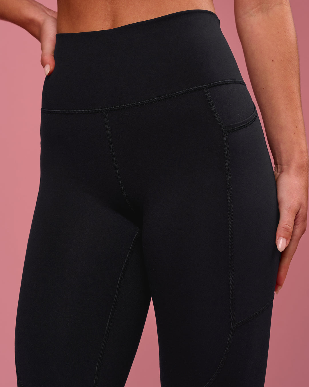 Woman wearing Rep Ultra High-Rise 7/8 Legging Pockets - Black-Pink Rose | Model:Issy | Size:XS - view 5