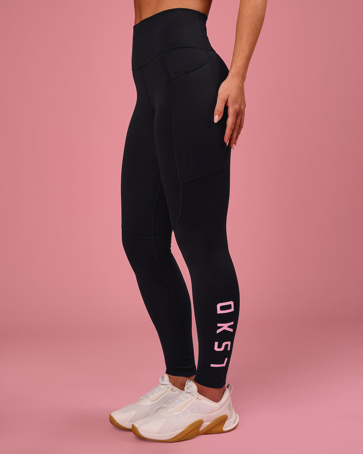 Woman wearing Rep Ultra High-Rise Full Length Legging Pockets - Black-Pink Rose | Model:Issy | Size:XS