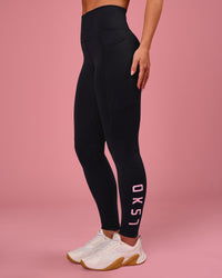 Woman wearing Rep Ultra High-Rise Full Length Legging Pockets - Black-Pink Rose | Model:Issy | Size:XS | Thumbnail Index: 0