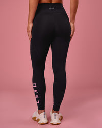 Woman wearing Rep Ultra High-Rise Full Length Legging Pockets - Black-Pink Rose | Model:Issy | Size:XS | Thumbnail Index: 1