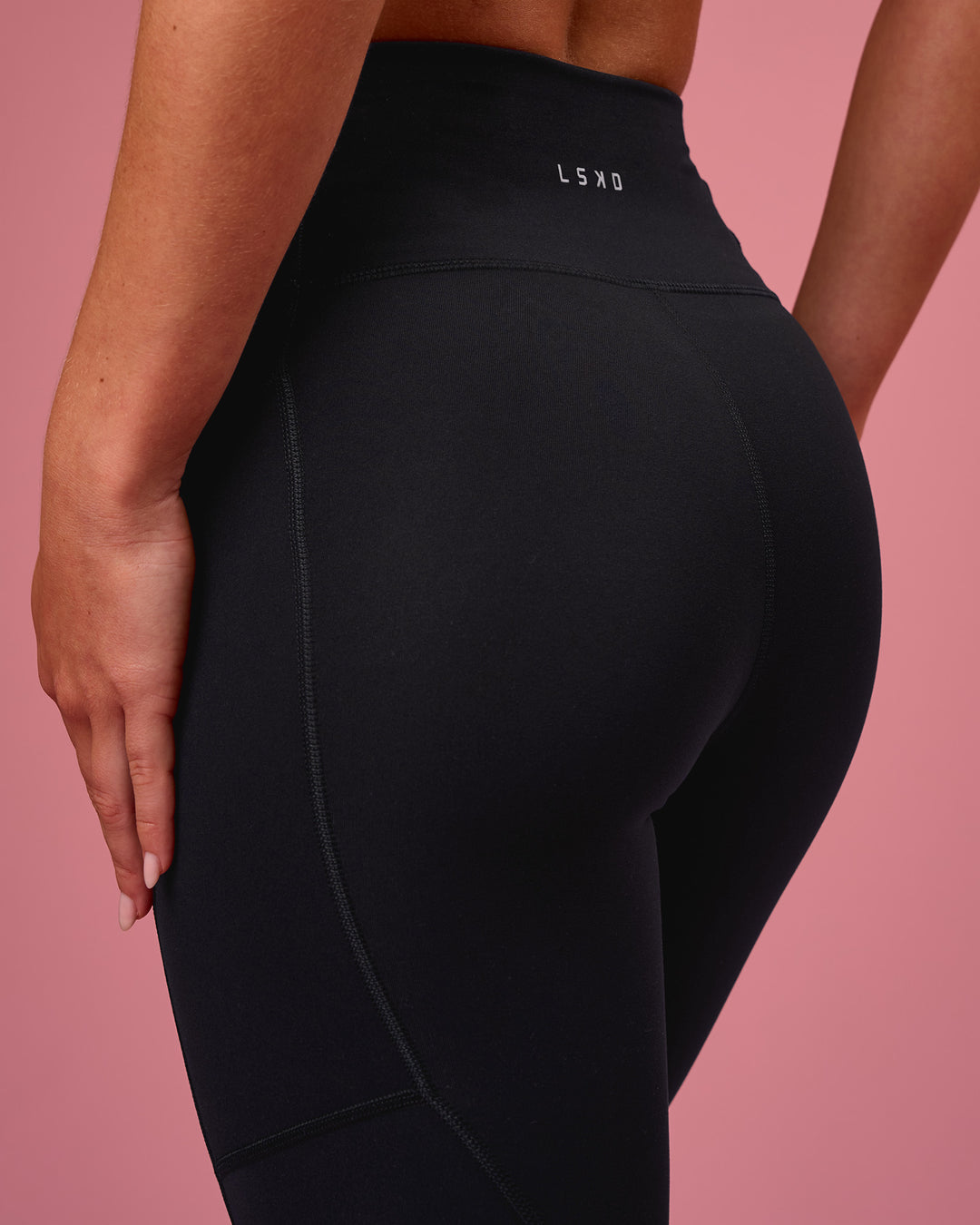 Woman wearing Rep Ultra High-Rise Full Length Legging Pockets - Black-Pink Rose | Model:Issy | Size:XS - view 4