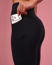 Woman wearing Rep Ultra High-Rise Full Length Legging Pockets - Black-Pink Rose | Model:Issy | Size:XS | Thumbnail Index: 6