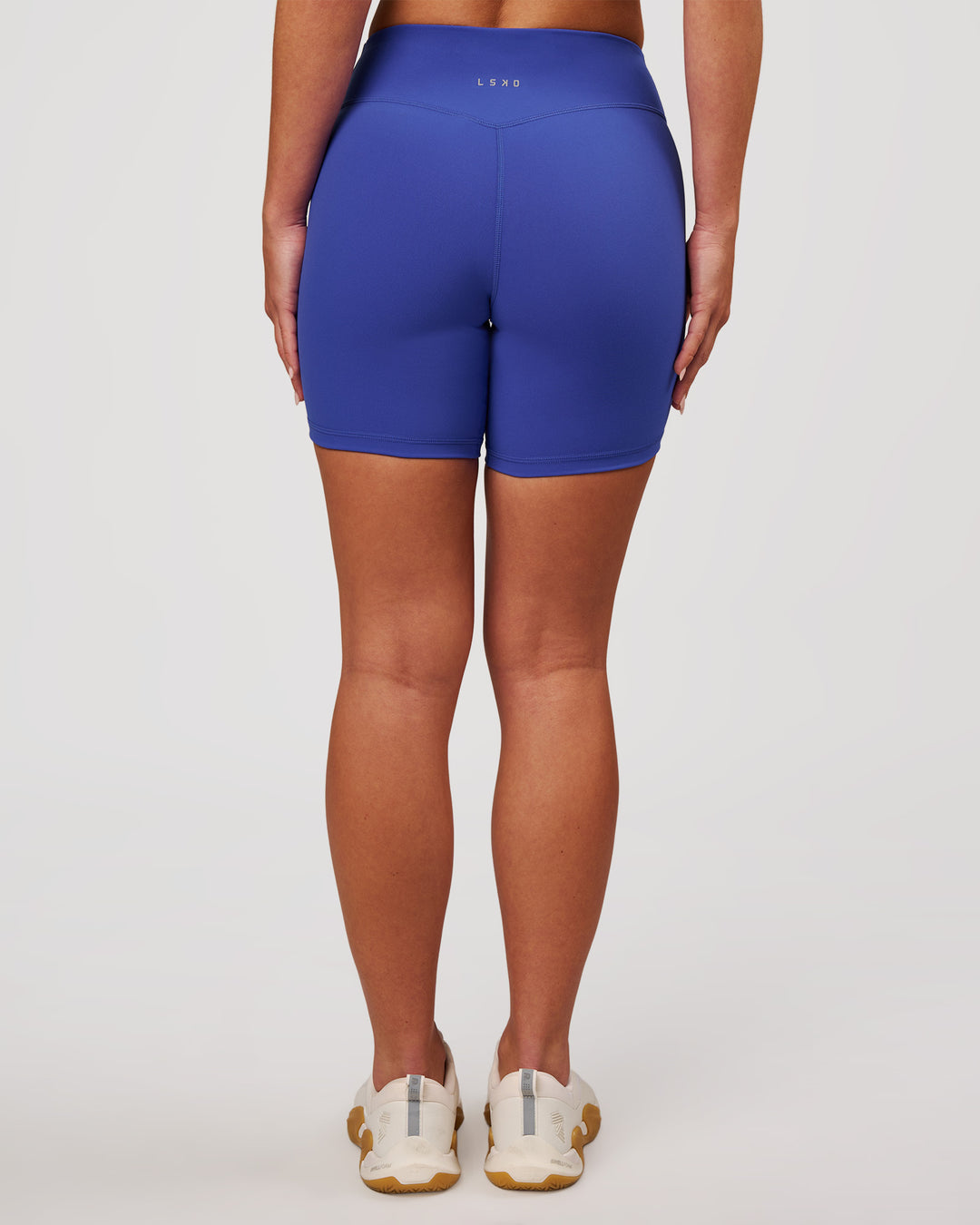 Woman wearing RXD Mid-Rise 6" Short - Power Cobalt | Model:Issy | Size:XS - view 3
