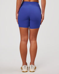 Woman wearing RXD Mid-Rise 6" Short - Power Cobalt | Model:Issy | Size:XS | Thumbnail Index: 2