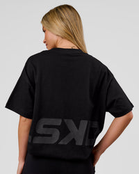 Woman wearing Shadow Mark Heavyweight Oversized Tee - Black-Onyx | Model:Issy | Size:XS | Thumbnail Index: 2