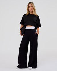 Woman wearing Shadow Mark Heavyweight Oversized Tee - Black-Onyx | Model:Issy | Size:XS | Thumbnail Index: 8