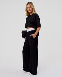 Woman wearing Shadow Mark Heavyweight Oversized Tee - Black-Onyx | Model:Issy | Size:XS | Thumbnail Index: 11