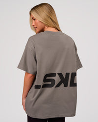 Woman wearing Shadow Mark Heavyweight Oversized Tee - Storm Front-Onyx | Model:Issy | Size:XS | Thumbnail Index: 2