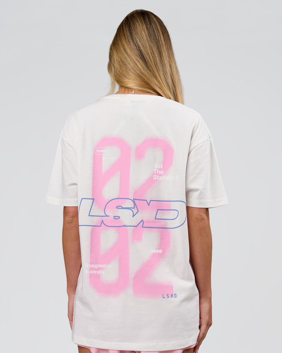 Woman wearing SoCal 26 FLXCotton Oversize Tee  - Off White-Pink Rose | Model:Issy | Size:XS - view 3