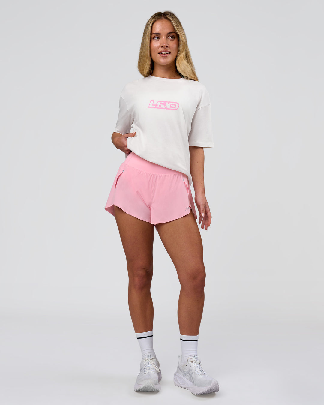 Woman wearing SoCal 26 FLXCotton Oversize Tee  - Off White-Pink Rose | Model:Issy | Size:XS - view 9