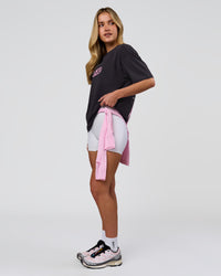 Woman wearing SoCal 26 FLXCotton Oversize Tee  - Onyx-Pink Rose | Model:Issy | Size:XS | Thumbnail Index: 14