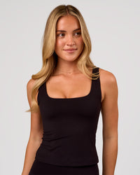 Woman wearing Staple 2.0 Active Shelf Bra Tank - Black | Model:Issy | Size:XS | Thumbnail Index: 0