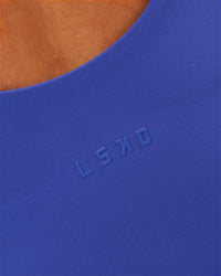Woman wearing Staple 2.0 Active Shelf Bra Tank - Power Cobalt | Model:Issy | Size:XS | Thumbnail Index: 4