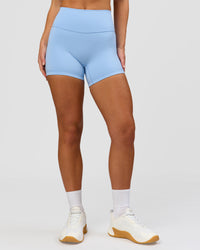 Woman wearing Strong is Beautiful Fusion High-Rise 4" Short - Open Air | Model:Issy | Size:XS | Thumbnail Index: 5