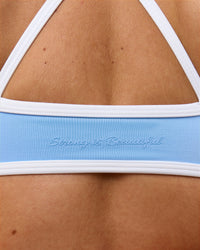 Woman wearing Strong is Beautiful Sports Bra - Open Air-White | Model:Issy | Size:XS | Thumbnail Index: 3