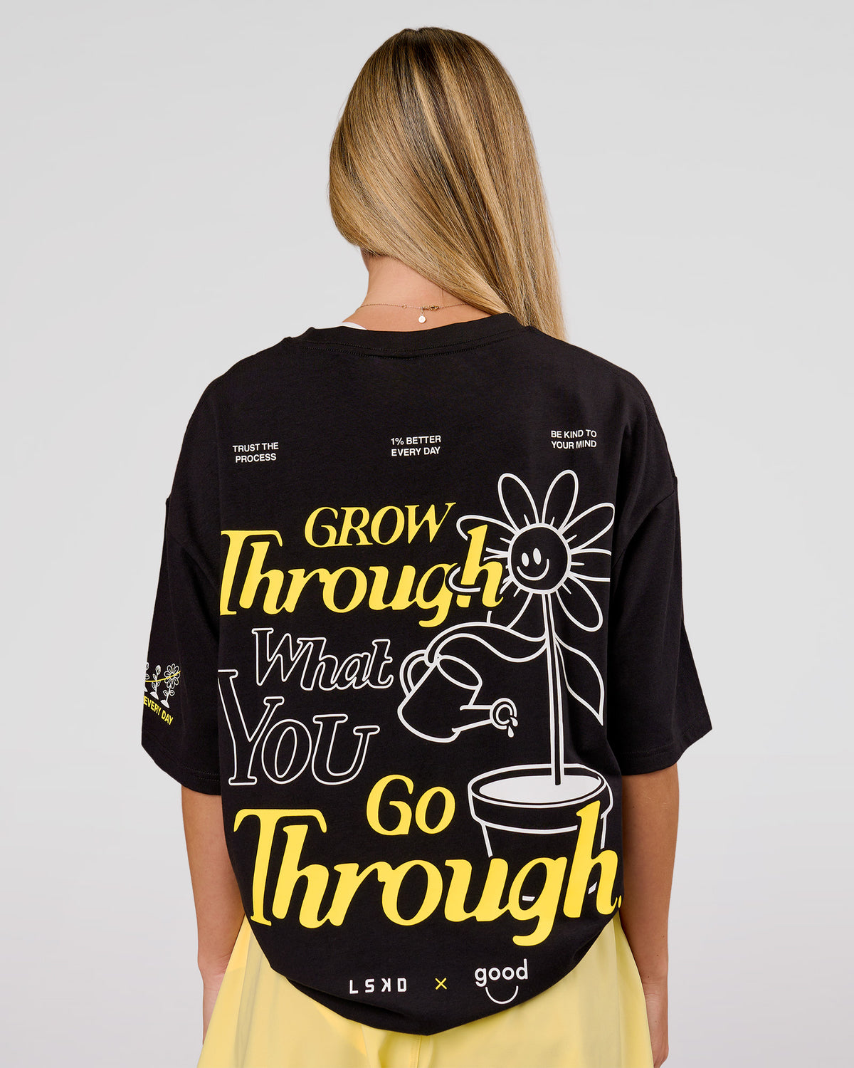 Woman wearing TGHF X LSKD 26 FLXCotton Oversized Tee - Black | Model:Issy | Size:XS - view 2