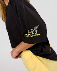 Woman wearing TGHF X LSKD 26 FLXCotton Oversized Tee - Black | Model:Issy | Size:XS | Thumbnail Index: 9
