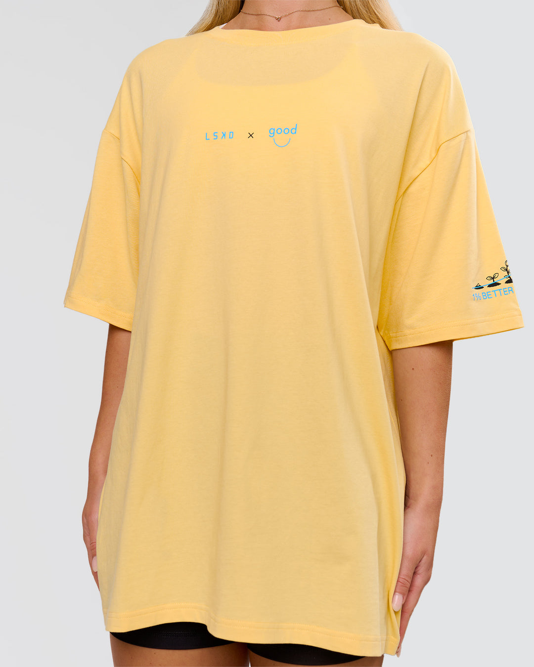 Woman wearing TGHF X LSKD 26 FLXCotton Oversized Tee - Lemon | Model:Issy | Size:XS - view 12