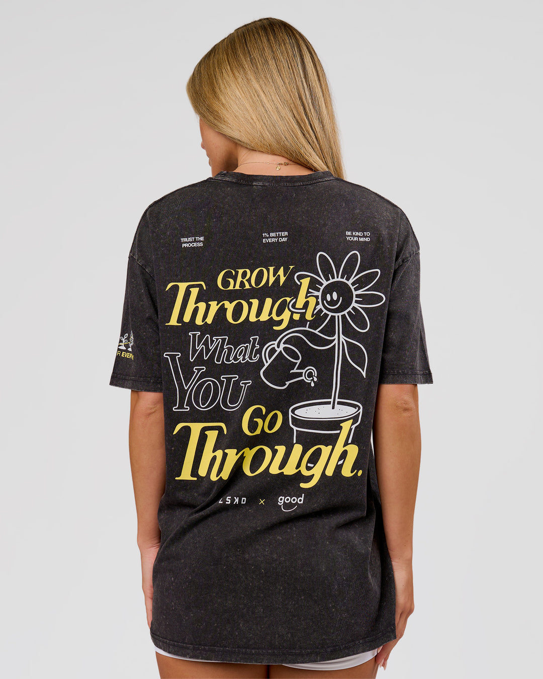 Woman wearing TGHF X LSKD 26 FLXCotton Oversized Tee - Black Washed | Model:Issy | Size:XS - view 2