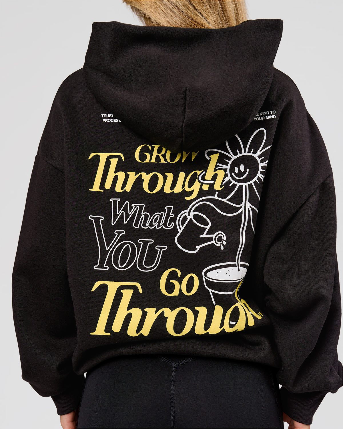 Woman wearing TGHF X LSKD 26 Oversized Hoodie - Black | Model:Issy | Size:XS - view 2