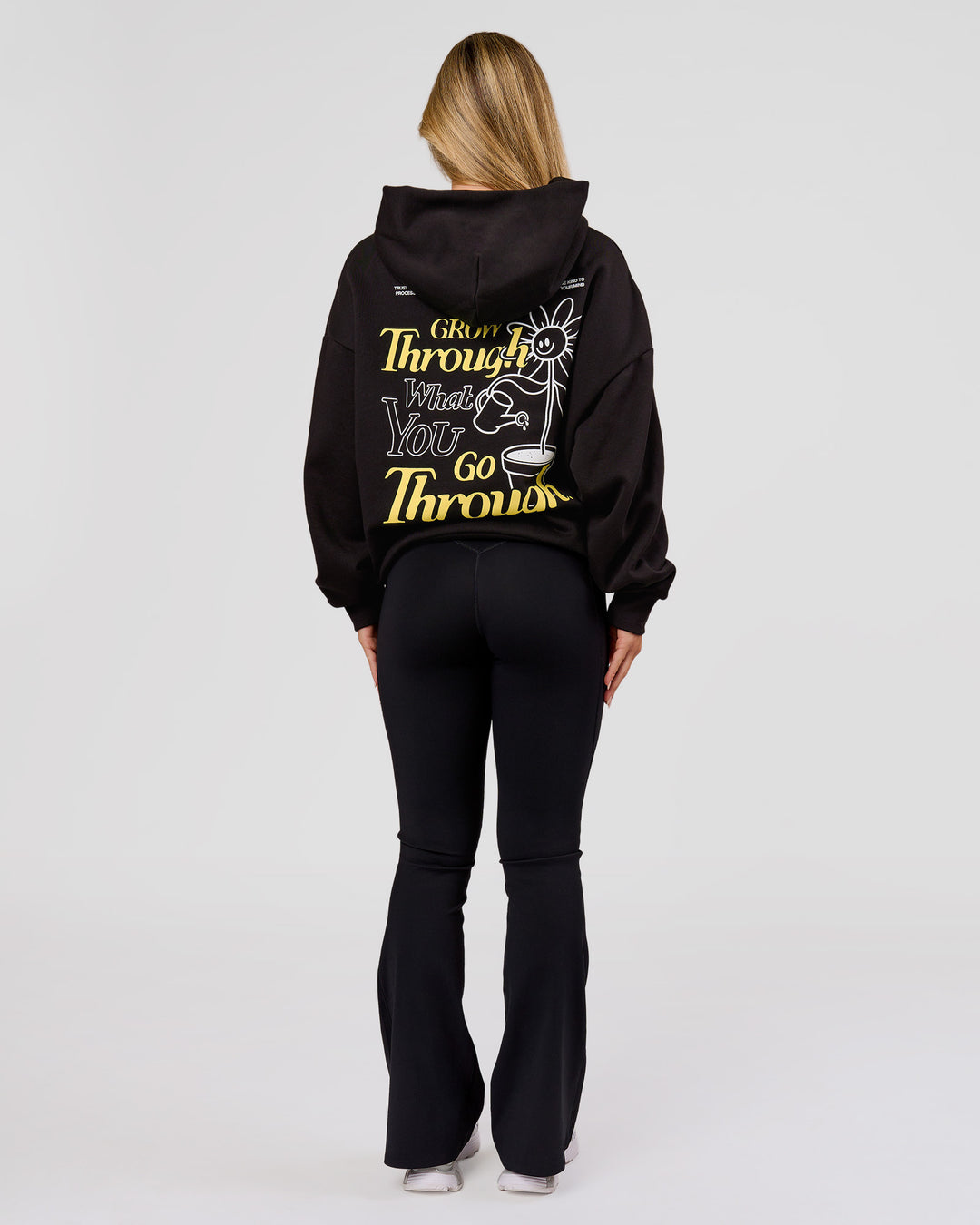 Woman wearing TGHF X LSKD 26 Oversized Hoodie - Black | Model:Issy | Size:XS - view 8