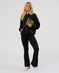 Woman wearing TGHF X LSKD 26 Oversized Hoodie - Black | Model:Issy | Size:XS | Thumbnail Index: 9