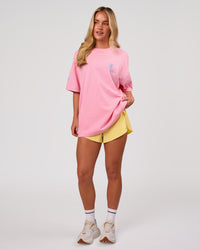 Woman wearing Values Manifesto Heavyweight Oversized Tee  - Pink Rose-Open Air | Model:Issy | Size:XS | Thumbnail Index: 11