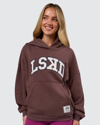 Woman wearing Varsity Boxy Hoodie - Cocoa Powder-Off White | Model:Issy | Size:XS | Thumbnail Index: 4