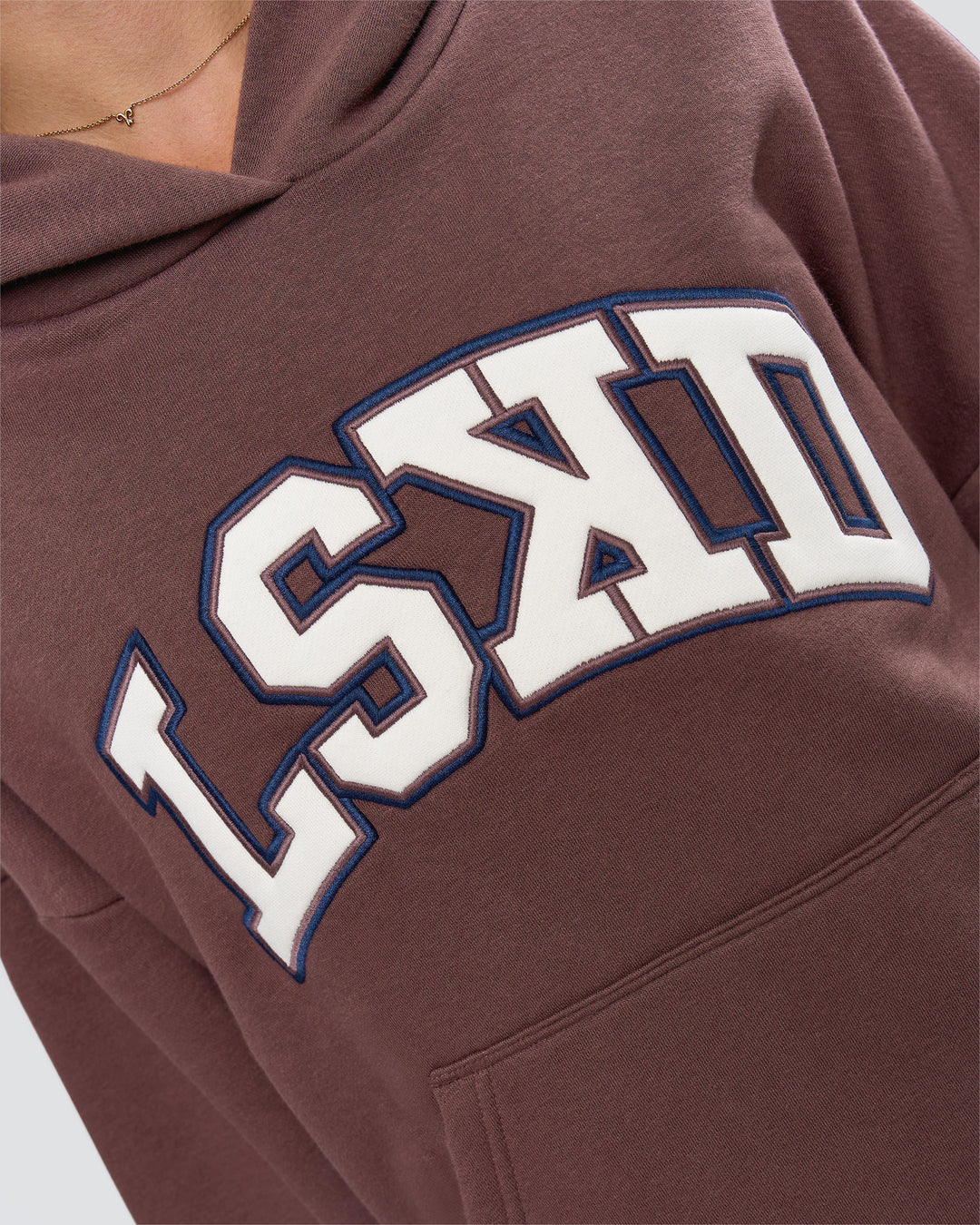 Woman wearing Varsity Boxy Hoodie - Cocoa Powder-Off White | Model:Issy | Size:XS - view 19