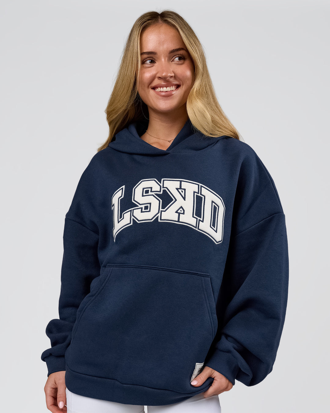 Woman wearing Varsity Boxy Hoodie - Future Navy-White | Model:Issy | Size:XS - view 14