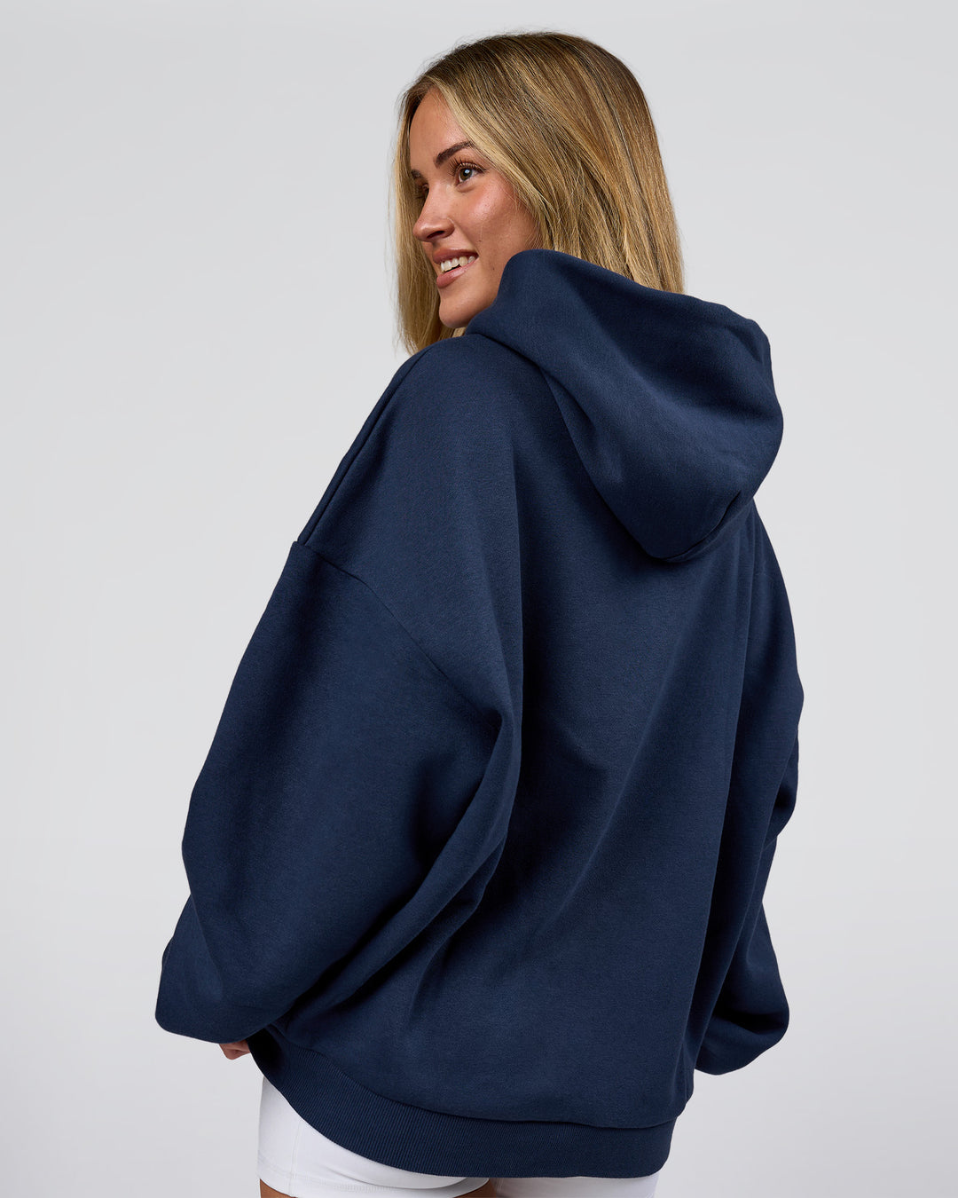 Woman wearing Varsity Boxy Hoodie - Future Navy-White | Model:Issy | Size:XS - view 15