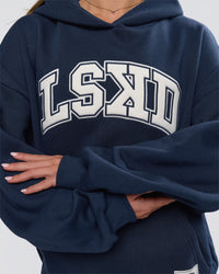 Woman wearing Varsity Boxy Hoodie - Future Navy-White | Model:Issy | Size:XS | Thumbnail Index: 18