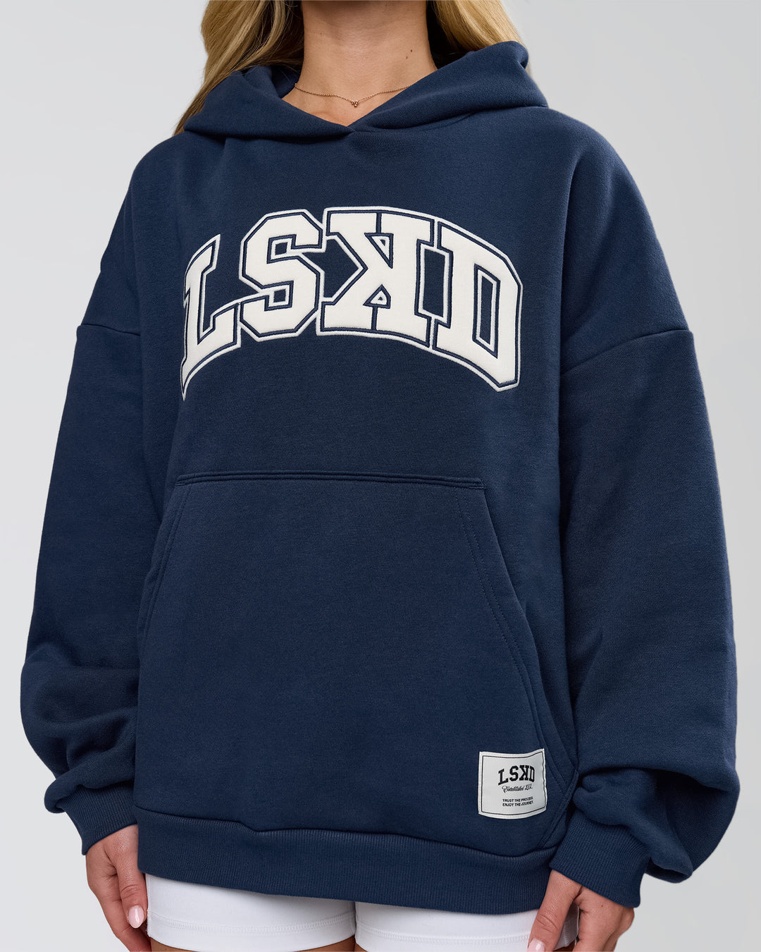 Woman wearing Varsity Boxy Hoodie - Future Navy-White | Model:Issy | Size:XS - view 16