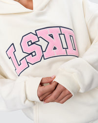 Woman wearing Varsity Boxy Hoodie - Off White-Pink Rose | Model:Issy | Size:XS | Thumbnail Index: 16