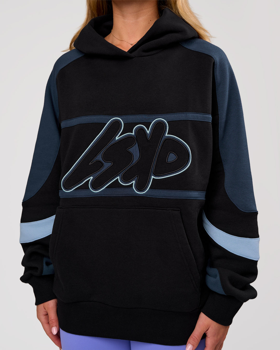 Woman wearing Vibe Oversized Hoodie - Black-Future Navy | Model:Issy | Size:XS - view 6