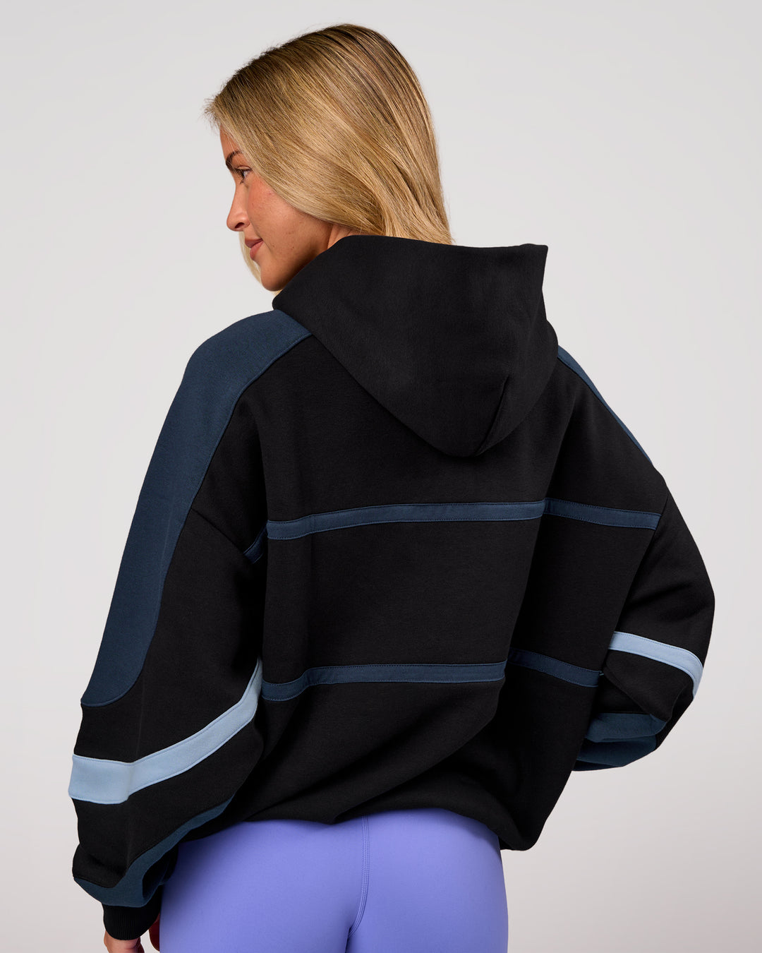 Woman wearing Vibe Oversized Hoodie - Black-Future Navy | Model:Issy | Size:XS - view 8