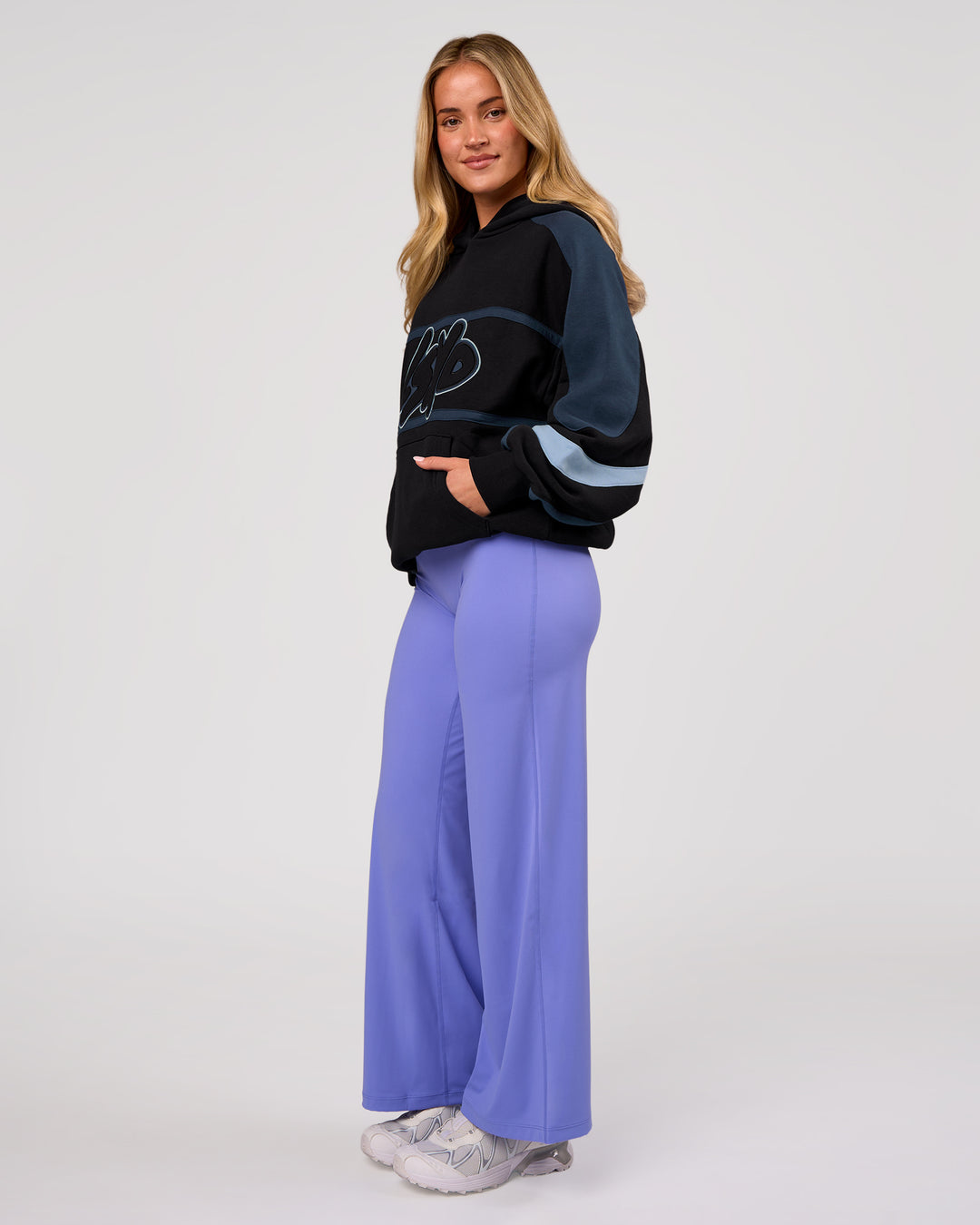 Woman wearing Vibe Oversized Hoodie - Black-Future Navy | Model:Issy | Size:XS - view 10