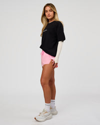 Woman wearing VS1 Enjoy The Journey FLXCotton Oversize Tee - Black | Model:Issy | Size:XS | Thumbnail Index: 6