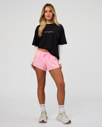 Woman wearing VS1 Enjoy The Journey FLXCotton Oversize Tee - Black | Model:Issy | Size:XS | Thumbnail Index: 8